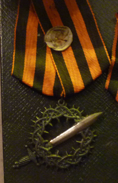 Награда Добровольческой армии «Знак отличия Первого Кубанского похода» («За Ледяной поход») на Георгиевской ленте